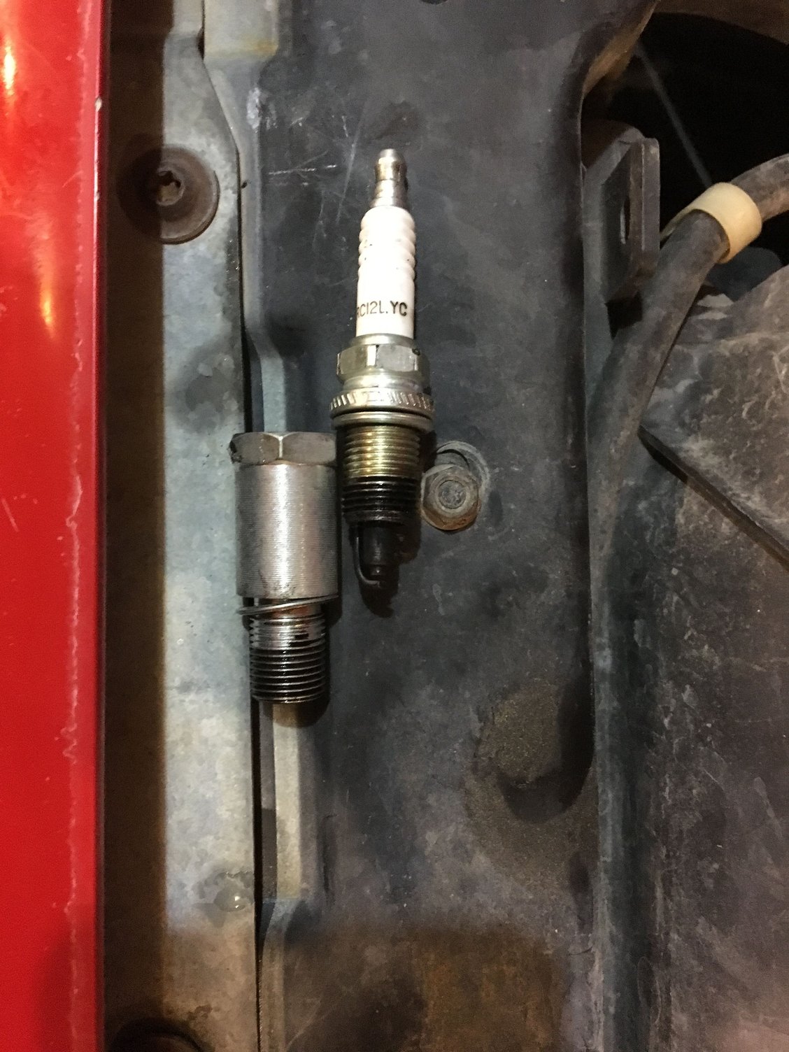 Spark plug spacer - Jeep Cherokee Forum