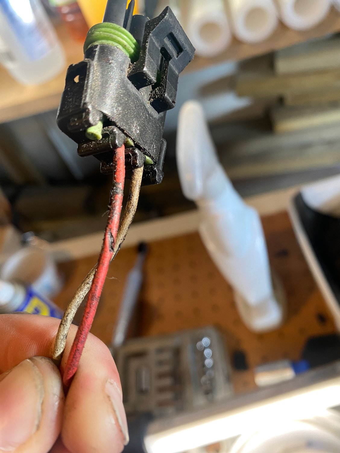 The wire also had a part where the wire was exposed due to wear, would short out if touching metal no? 