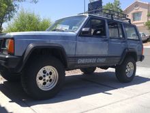 Lift, roof rack and gas can mount