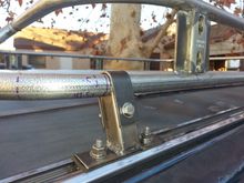 Intergrated into roof track rails. SS hardware.