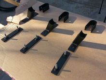 AKA gutter mounts. I use 1x1 sq tube and coped to fit roof rack basket. To fit on my 1988 renix.
