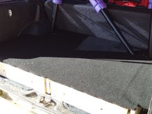 A roll of automotive carpet from Autozone covers the deck. I also added some sheeting between the rear seat and the C-pillar on the cage. The drawers don't extend that far, so I have more storage for things that don't get used that much (jack, chocks, etc). Only accessible by pulling the seat back forward.
