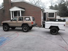 Heading out for some cold winter camping.  The trailer was built to match our old white TJ.  I had to build a goose neck for it to reach the bumper.  It was 8" short.
