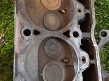 Well after exam head its appears obvious its cracked!!If you look at this pict u can see it in the middle area and the valves are Shot!!! Lol, I could get discouraged but nothing will change! Luckily i have saved a head from previous build on 1 my Comanches ..will see if its any good i guess! Now keep degreasing and start to order all the goodies for rebuild hopfully soon.. wait to see how block looks at shop.