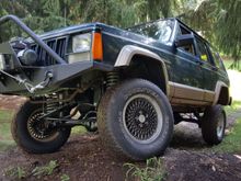 Got the bumper installed and lift all finished. punctured a tire on a test ride and had to put the tiny spare on. ride quality wasn't too bad. once the lift settled in it wasn't too much rougher than stock ride. the new track bar got rid of the death wobble id get around 50mph. Also cleaned and put a fresh coat of paint on the axles.