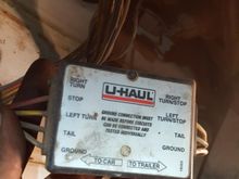 trailer hitch light. if you notice, the wires for Tail Ground and Left Turnstop are all attached, but for some reason the green wire (The one that had been exposed) is cut and instead spliced to some random unknown green wire leading into car