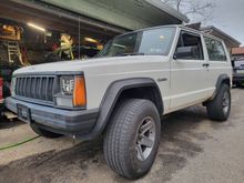 Try these wheels and tires on. It has a 2 inch lift but the springs are completely clapped out. 