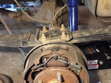 I replaced my shocks a month or so later. I am also experiencing a clicking noise from the rear brakes, but I've narrowed it down to one of the drums.