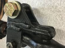 So, I’m gonna get a lot of grief for this but I decided to try the hydro steer setup on my stockish steering. I do have the ZJ V8 tierod so we’ll see how it holds up. This is the bracket I built to attach the ram to the draglink.