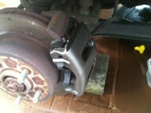 Front brakes were in bad shape too. Bad slide pins caused diagonal pad wear. Replaced calipers and pads.