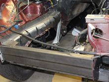 The front of the engine compartment gets tied from pass to drive side with .120 wall 2X5 rectangular tubing. Better to over build it a bit.