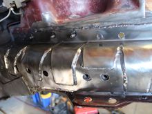 Bottom left you can see the "L" shaped tie in to the Rustys stiffeners that strengthen the "frame rails"