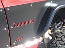 Water-jet cut the fenders with the Cummins name, courtesy of "Dirtbound"