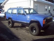 Cleaned it up and painted the old rusty chrome wheels black with the 31's. Waitin on getting the windows tinted and the 33's mounted on soft 8's.