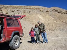 My oldest Tyler and his friend John, puttin up with monkey boy!! The Dolly Varden Mine is just above and behind them.