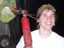 Someone get this kid a screwdriver!