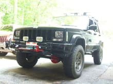 Right before I sold her..
2000 XJ Classic loaded, 120k 4.0 auto D30/C8.25
3.5&quot; RE superride lift
265/75R16 BFG ATs
TrailJammer Programmer, intake and bored TB
Surco Rack with Hella 500s in front, cheapys in the back and Hella 550s on the bumper
Custom tinted taillights, H4 headlights and clear corners
Front mount Hi-Lift
Front Rugged Ridge Towhooks, and Class III hitch with custom towhook
Panasonic 7&quot; flip up touchscreen DVD player, Pioneer speakers front and rear, 2 12&quot; Pioneer Champion pro series 3000W a piece subs 0G wiring to twin RF amps
And I am sure I am forgetting somethings!
Never even saw a real trail, and was in prestine condition...