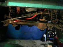 custom adjustable track bar,new ball joint,pads and rotors which you cant really see.