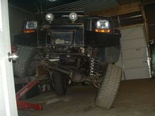 97 cherokee 001 cranked up on my snap-on mid rise lift.