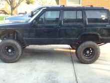 tinted windows front to rear, 15x10 krager d-window rims, torched fenders in front it gives it character people lol
