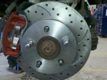 Rototech Cross-Drilled and Slotted Rotors, New Mopar OEM calipers w/ ceramic pads.