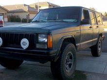 new hella lights before i rolled the front fender, and buffed the paint.