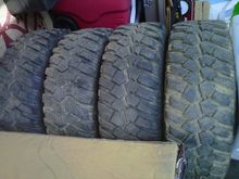 31x10.5 Definity Dakota MT, got 'em used, see how they do, likely go to ATs when theses are done.