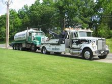 Poop truck with broken rims on 2nd axle
