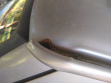 Gutter rust divers side looks like a hole but its not