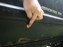 This hole opened up about a month ago now.  Found it while I was giving it a wash.