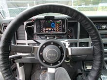 Speedo-Computer with audio controls on the left side, GPS on bottom, and speed minder on the right. (iPhone SPEEDOMETER app - $3.99 for full version)