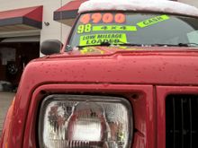 Sits up a bit, maybe tighten the hood latch could help a tad? Not sure if that is possible