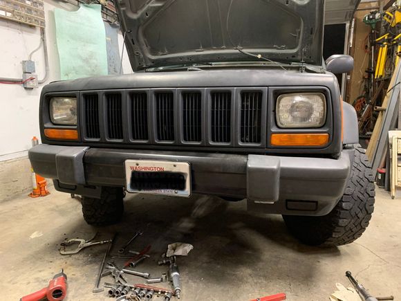 The bumper ends took a little clearance grinding on the inboard/lower area, then they bolted on. Even the stock license plat mount bolted on! The customer is going to finish up some more mods to make the winch and d-ring mounts accessible.  