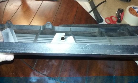 Two of the top mounting tabs were broken.