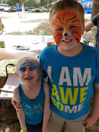 Izzie and Dyllon wanted their faces painted. Jordan didn't want any part of it.