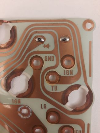 I still have to drill a hole on the bottom gauge for the machine screw that supllies power to the "TU" terminal (anyone have clarification what this is?)