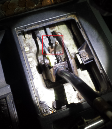 The cable leads to down here, and I noticed the plastic for it is broken.