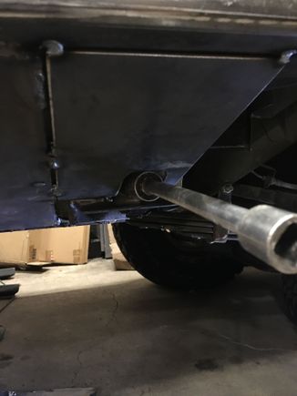 Plasma cut a 3/16” piece and tacked it in. Grab a deep 13/16”  socket and make sure you can access the bolt before ya weld it in.