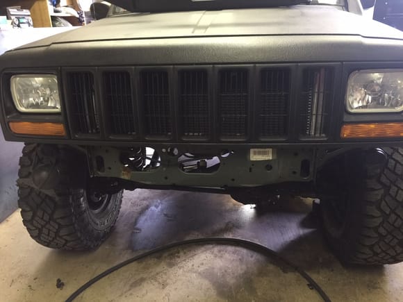 After removal of OEM bumper. I ended up spraying the bare metal black before installing the bumper.