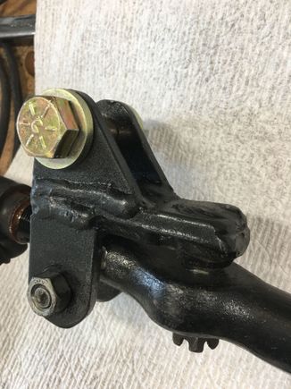 So, I’m gonna get a lot of grief for this but I decided to try the hydro steer setup on my stockish steering. I do have the ZJ V8 tierod so we’ll see how it holds up. This is the bracket I built to attach the ram to the draglink.