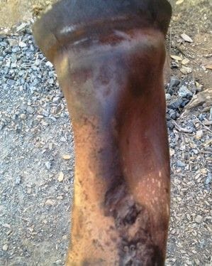 Factory pinch on down pipe near manifold flance