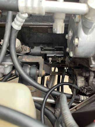  I mocked up the XJ coil bracket in the same location. I help up the van coil bracket pictured below to check fitment.