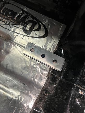 I made this little plate out of 14 ga. steel to distribute force out a bit. The two front holes only go through one layer of 18 ga. steel. 