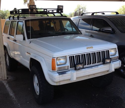 Straight and mostly clean. Dings or 2 on sides. Dent/scrapes at the back on top, like loading errors.
