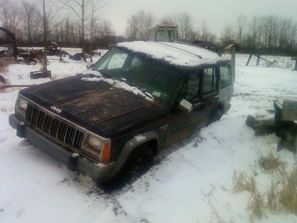 high centered in a deep rut