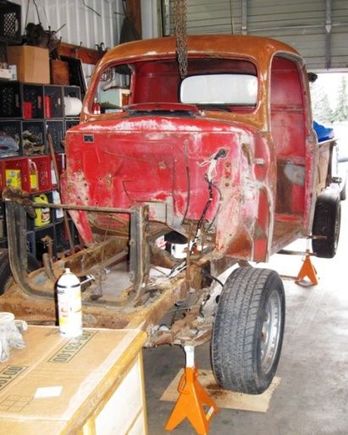The F-1 as she sits today. Pulled into garage hoping to get cab lifted and bed loosened prior to my front end parts arriving.The goal, set it onto the Exploder chassis and start mocking up body mounts while rebuilding the front end...