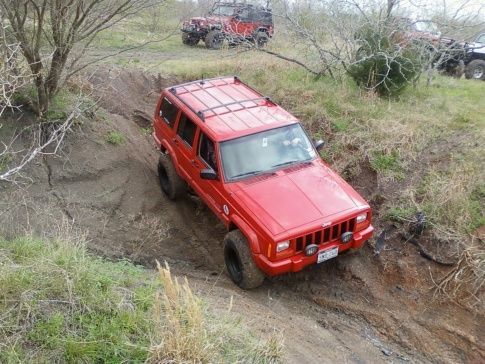 First offroad trip a month after the lift went on. In the playground at Brazos Valley Offroad Ranch. The front fender flares came off that day...
