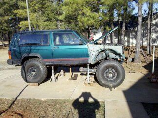 another pic... still needs to go up 3 more inches but my high lift jack is squirmy with the rear being on jackstands too... lol