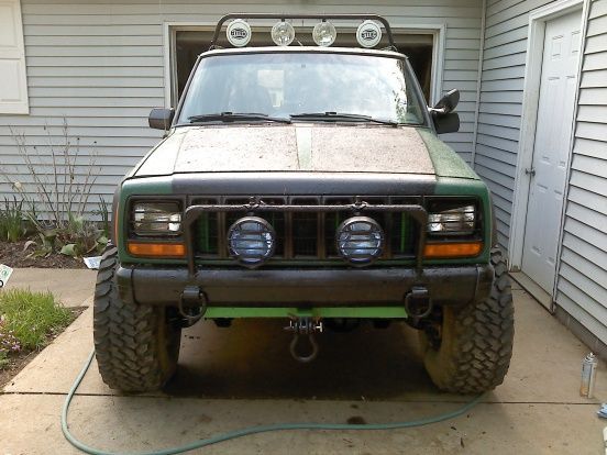 evil eye lids and thed hooks were just added. i made some supports behind the d rings just incase i wanna pull with em. but mainly for looks. these were just handing around in the garage so why not until i can get a custom bumper.