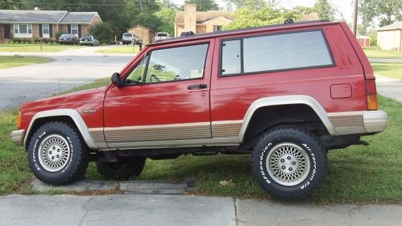 Back in the ditch...look at that tire in the air..lol